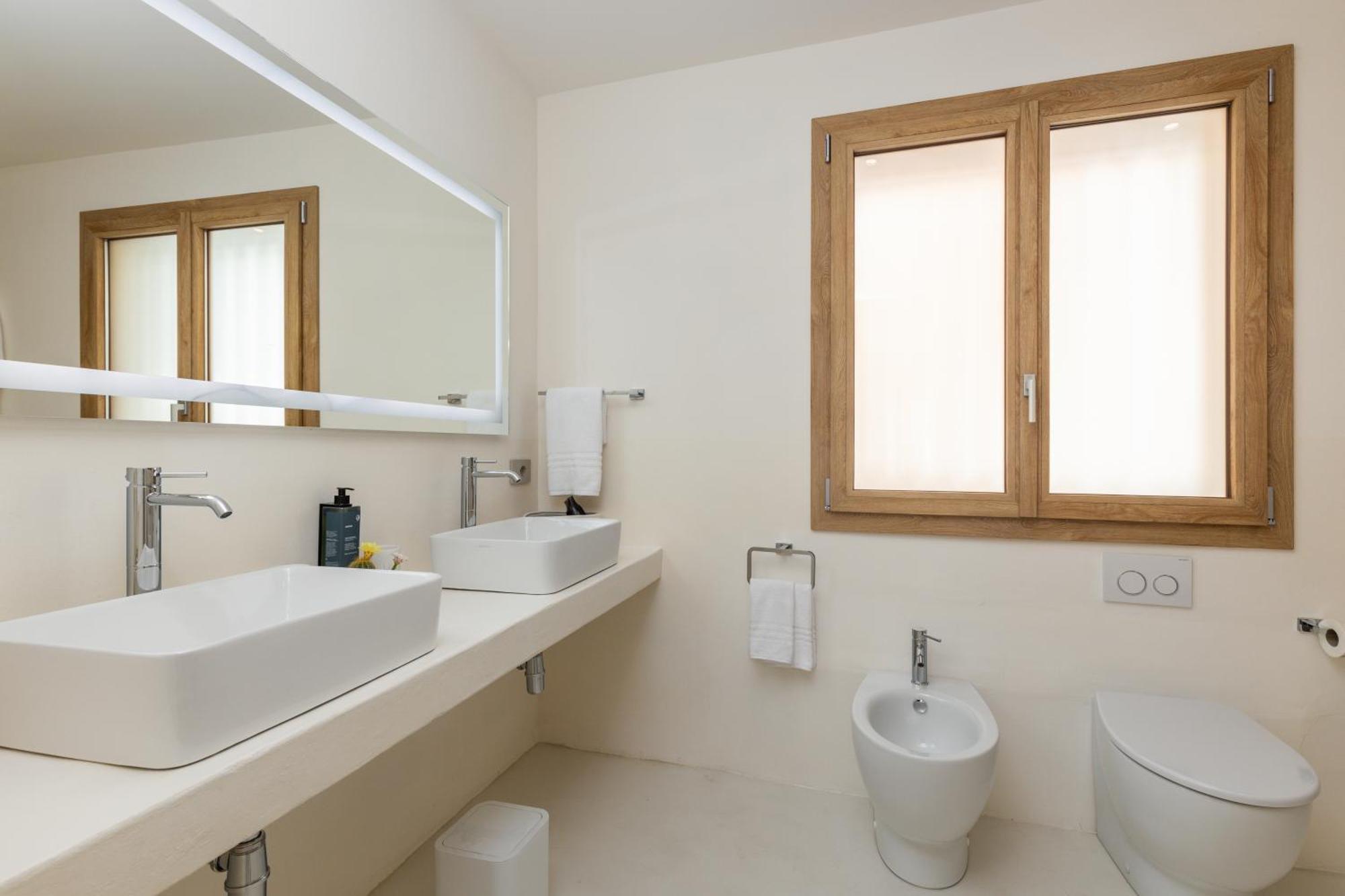 Ausentu Guest House Тортоли Экстерьер фото